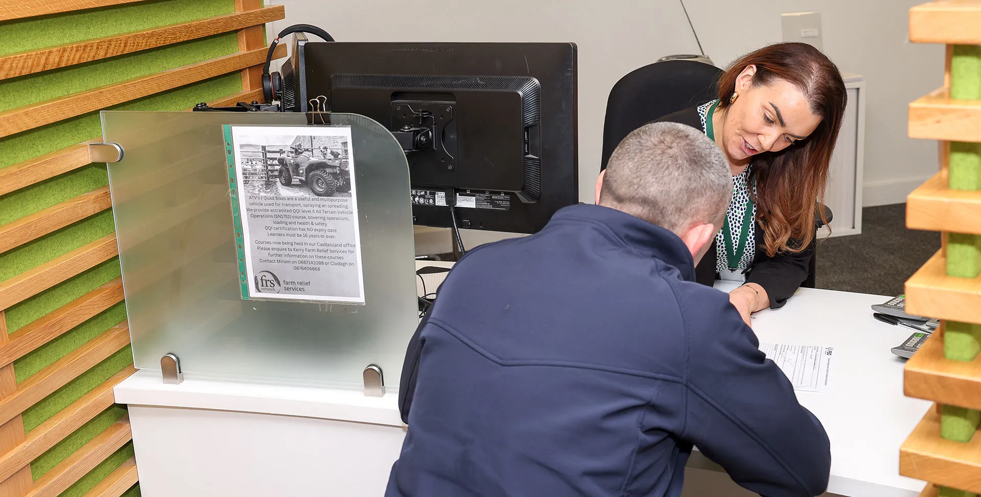 man handing keys to another person